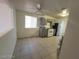 Kitchen with stainless steel refrigerator and white appliances at 2564 San Marcos St, Las Vegas, NV 89115