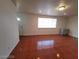 Living room with tile floor and large window provides ample natural light at 2564 San Marcos St, Las Vegas, NV 89115
