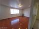 Bright living room features tile floors, recessed lighting, and window at 2564 San Marcos St, Las Vegas, NV 89115