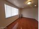 Living room with tiled floor and a window that allows natural light at 2564 San Marcos St, Las Vegas, NV 89115