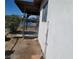 A side yard featuring a chain link fence, side of the house, and dirt at 2564 San Marcos St, Las Vegas, NV 89115