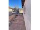 Sideyard of home with brick walkway at 2564 San Marcos St, Las Vegas, NV 89115
