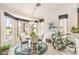 Cozy breakfast nook featuring a round table, stylish chairs, and large windows at 2608 Golfside Dr, Las Vegas, NV 89134
