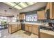 Bright kitchen with stainless steel appliances and breakfast nook in the background at 2608 Golfside Dr, Las Vegas, NV 89134
