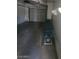 Attached garage with visible garage door mechanism and space at 2761 Lodestone Dr # 63, Las Vegas, NV 89117