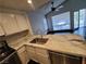 Bright kitchen with stainless steel appliances and access to the living area at 2761 Lodestone Dr # 63, Las Vegas, NV 89117