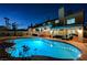 Stunning backyard with a swimming pool, covered patio, and ample space for entertaining at 2813 Via Avanti St, Henderson, NV 89074