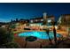 Expansive backyard with a sparkling pool, spa, and a covered patio perfect for outdoor living at 2813 Via Avanti St, Henderson, NV 89074