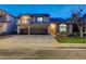 Charming two-story home with a three-car garage, balcony and tile roof in a well-maintained neighborhood at 2813 Via Avanti St, Henderson, NV 89074