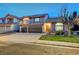 Charming two-story home with desert landscaping, three-car garage, and a tiled roof set at dusk at 2813 Via Avanti St, Henderson, NV 89074