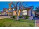 Charming two-story home with desert landscaping, three-car garage, and a tiled roof at 2813 Via Avanti St, Henderson, NV 89074