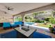 Entertainer's dream with a covered patio overlooking a pool and green landscape at 2813 Via Avanti St, Henderson, NV 89074
