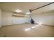 Spacious garage with plenty of room for storage and equipped with a water heater at 3330 Unicorn Ave, Pahrump, NV 89048