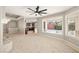 Open-concept living room connected to the kitchen, featuring plenty of natural light at 3330 Unicorn Ave, Pahrump, NV 89048