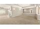 Spacious living room with a fireplace and large windows allowing for plenty of natural light at 3330 Unicorn Ave, Pahrump, NV 89048