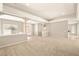 Bright living room with elegant columns, recessed lighting, and ample space for entertaining at 3330 Unicorn Ave, Pahrump, NV 89048