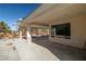 Spacious covered patio with an open view of the backyard and landscaping at 3330 Unicorn Ave, Pahrump, NV 89048