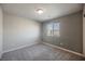 Clean bedroom with carpet, natural lighting and neutral-colored walls at 3747 Lambent Ave, North Las Vegas, NV 89084