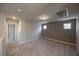Spacious bonus room with neutral carpet and access to bedrooms at 3747 Lambent Ave, North Las Vegas, NV 89084