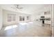 Bright living room with tile flooring, recessed lighting and access to the backyard at 3747 Lambent Ave, North Las Vegas, NV 89084