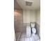 Bathroom featuring tiled shower and floors plus a modern toilet at 3797 Monument St, Las Vegas, NV 89121