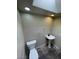 Bathroom featuring a toilet and sink with a skylight above, providing natural light at 3797 Monument St, Las Vegas, NV 89121
