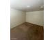 Empty bedroom featuring neutral paint, carpeting, and standard lighting fixtures at 3797 Monument St, Las Vegas, NV 89121