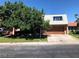 Beautiful brick home with mature landscaping, a two-car garage, and inviting curb appeal at 3797 Monument St, Las Vegas, NV 89121