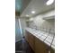 Hallway with tiled counter, sink and sliding door access at 3797 Monument St, Las Vegas, NV 89121