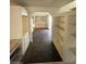 Hallway leading to the kitchen, with custom cabinets and tons of storage at 3797 Monument St, Las Vegas, NV 89121