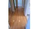 Hallway with hardwood floors, closet with sliding mirror doors and open doorways at 3797 Monument St, Las Vegas, NV 89121