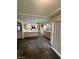 View of kitchen with island, appliances, tiled counters and stone flooring at 3797 Monument St, Las Vegas, NV 89121