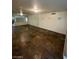 Bright living room with mirrored walls, ample space, and unique tile flooring at 3797 Monument St, Las Vegas, NV 89121