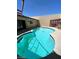 Backyard pool featuring a spa and built-in grill, offering a luxurious outdoor experience at 3797 Monument St, Las Vegas, NV 89121