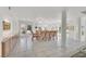 Dining room with French doors and windows, complemented by tile flooring and recessed lighting at 3938 E Russell Rd, Las Vegas, NV 89120