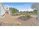 Beautiful home with a brick driveway, mature landscaping, and manicured gardens at 3938 E Russell Rd, Las Vegas, NV 89120
