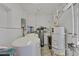 This utility room features newer water tanks and equipment at 3938 E Russell Rd, Las Vegas, NV 89120