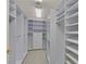 Spacious walk-in closet with custom shelving and ample storage space for organizing clothes and accessories at 3938 E Russell Rd, Las Vegas, NV 89120