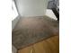 Spacious living room with carpet flooring and staircase at 4363 Spencer St # 8, Las Vegas, NV 89119