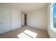 Bright bedroom with large windows, neutral paint, and carpet flooring at 4400 E Cactus Canyon Dr, Pahrump, NV 89061