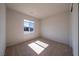 Bedroom featuring neutral tones, carpet flooring, and ample natural light at 4400 E Cactus Canyon Dr, Pahrump, NV 89061