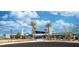 Stunning building exterior with manicured landscaping, palm trees, and modern architecture at 4400 E Cactus Canyon Dr, Pahrump, NV 89061