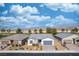 Aerial view of a single story home with desert landscaping and a golf course view at 4400 E Cactus Canyon Dr, Pahrump, NV 89061