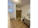 Bathroom features tiled flooring, shower, and vanity at 4508 W San Miguel Ave, North Las Vegas, NV 89032