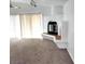 Bright living room featuring a fireplace, vaulted ceilings, and lots of natural light at 4508 W San Miguel Ave, North Las Vegas, NV 89032