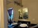 Bathroom with a framed mirror, granite counters and dual sinks at 4738 Laurel Canyon St, Las Vegas, NV 89129