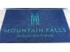 Close-up of a branded doormat featuring the community's name and tagline at 4755 Rossini St, Pahrump, NV 89061