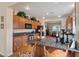 Stylish kitchen featuring granite countertops and wooden cabinets at 4755 Rossini St, Pahrump, NV 89061