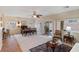 Open-concept living and dining area with ample natural light at 4755 Rossini St, Pahrump, NV 89061