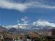 Scenic view of snow-capped mountains against a blue sky, enhancing the community's natural beauty at 4755 Rossini St, Pahrump, NV 89061